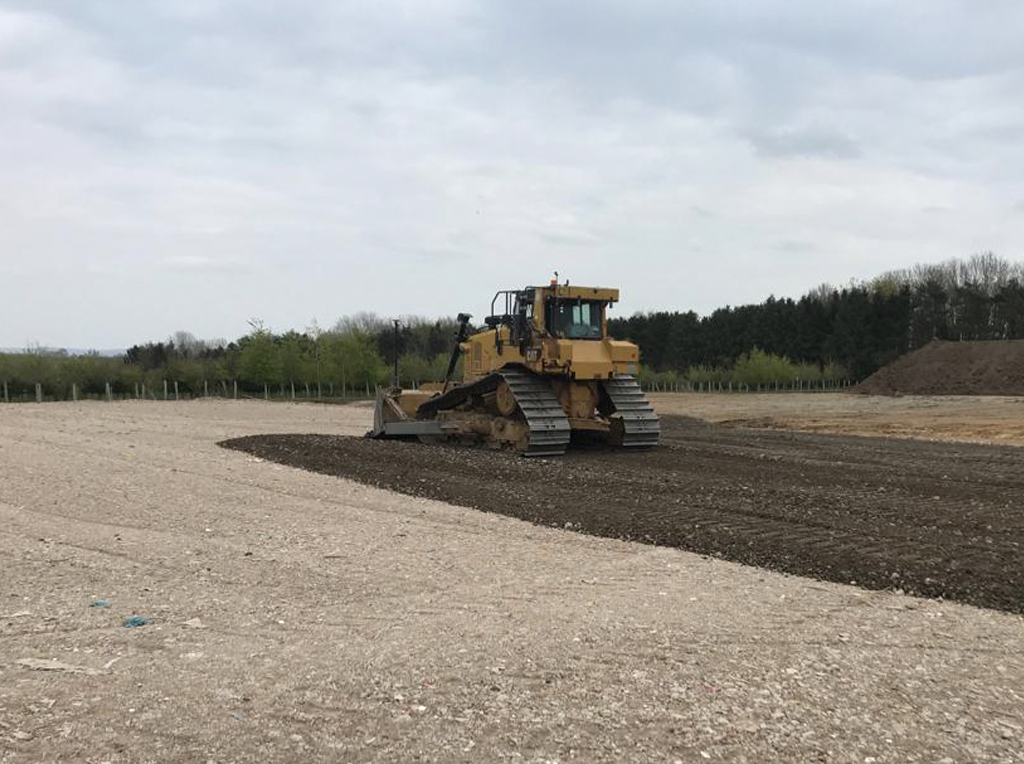 A P J Murphy Group Caterpillar Dozer flattening a construction site to create a working haul road for an infrastructure development